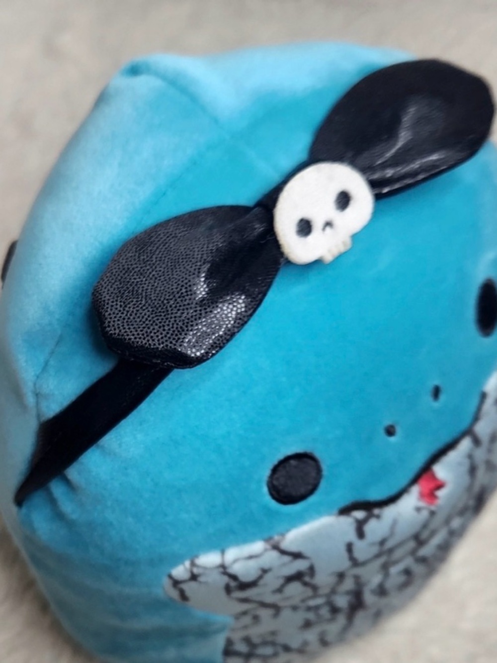 Blue Plush Character with Skull Bow Accent